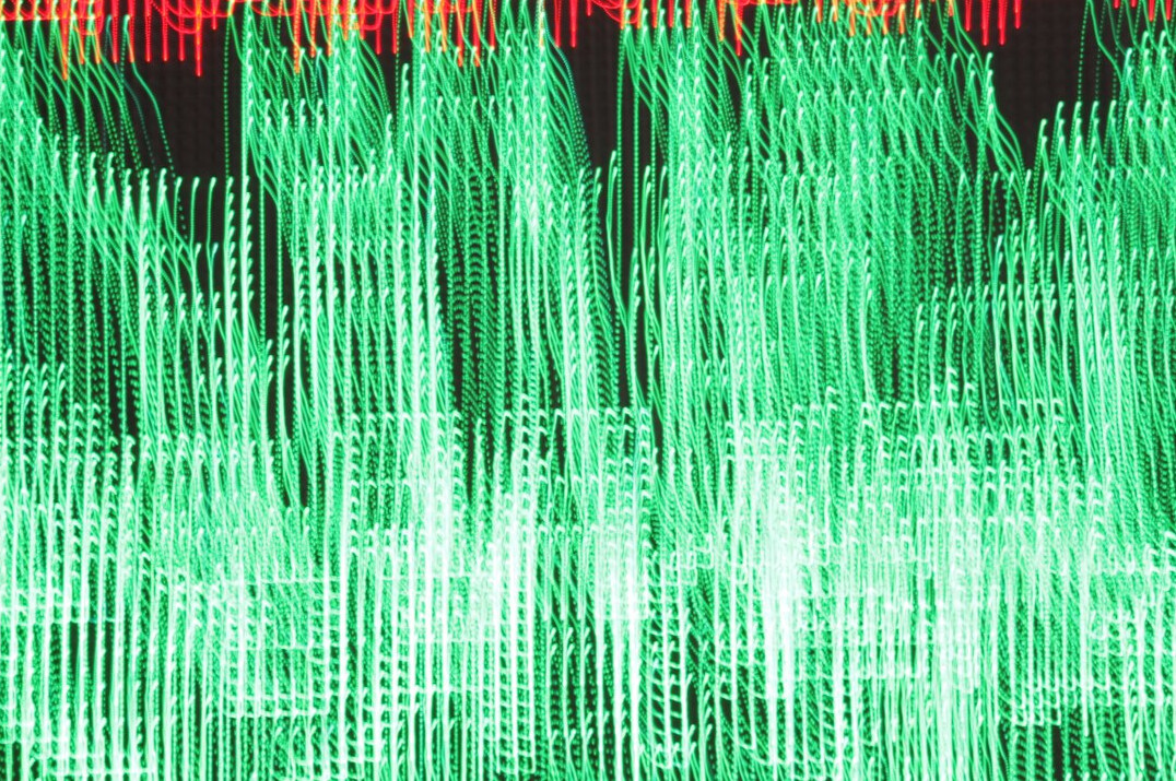Stock market chart displayed on a screen with rising graph lines